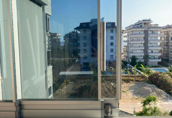 Двухкомнтаная квартира 2+1 в Алании, Турция 